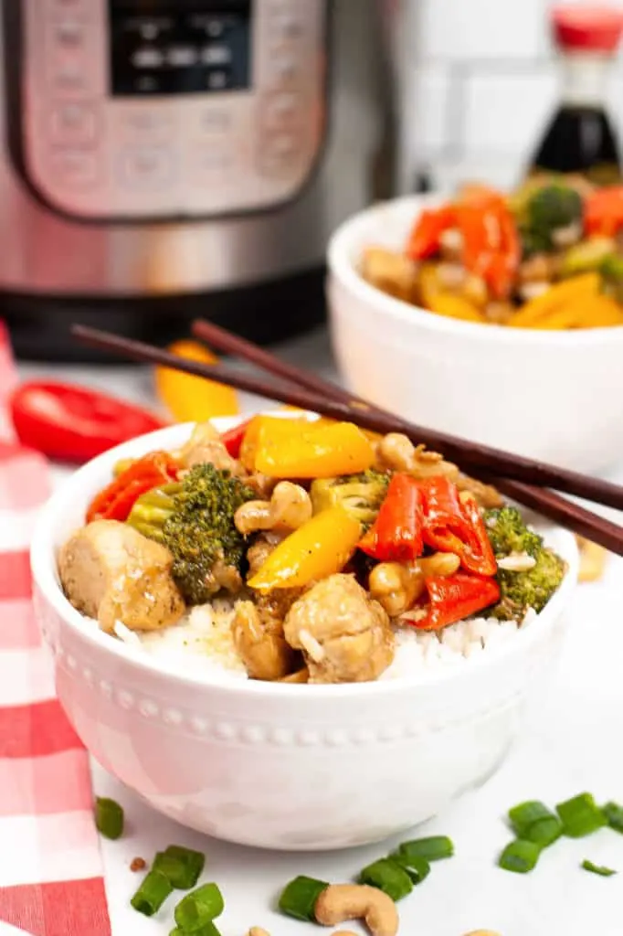 cashew chicken in white bowl